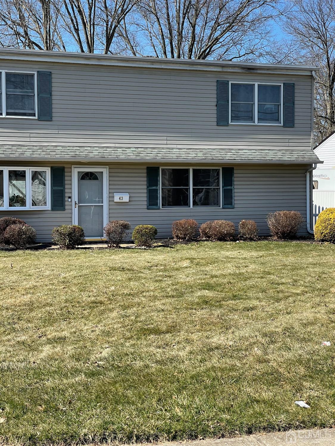 43 Brookville Road Edison, NJ 08817 - Photo 28 of 31 a front view of a house with a yard