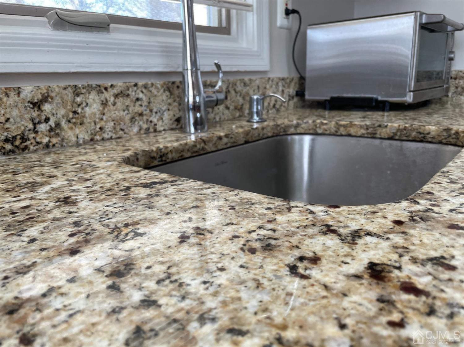 43 Brookville Road Edison, NJ 08817 - Photo 4 of 31 a view of a kitchen sink