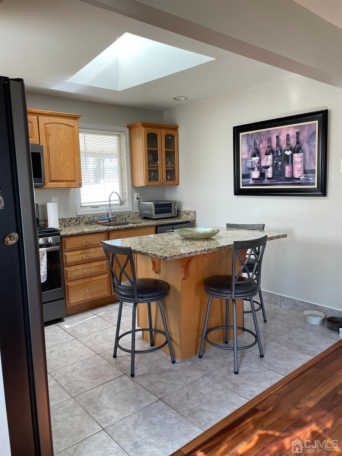 43 Brookville Road Edison, NJ 08817 - Photo 5 of 31 a view of a dining room with furniture