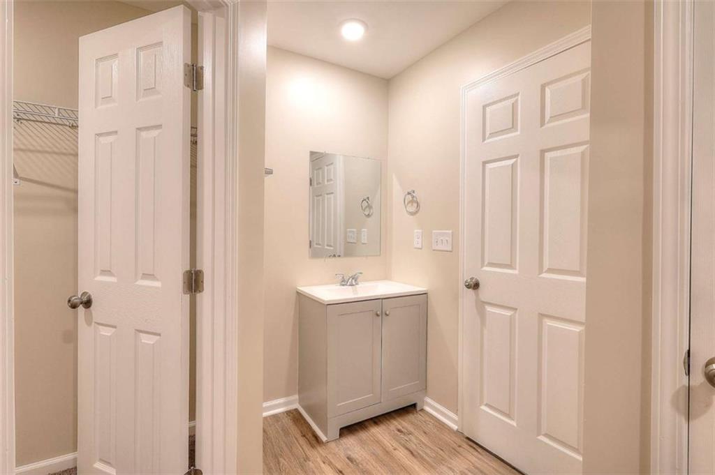 407 Wall Street Monroe, GA 30655 - Photo 18 of 51 a bathroom with a sink and a mirror