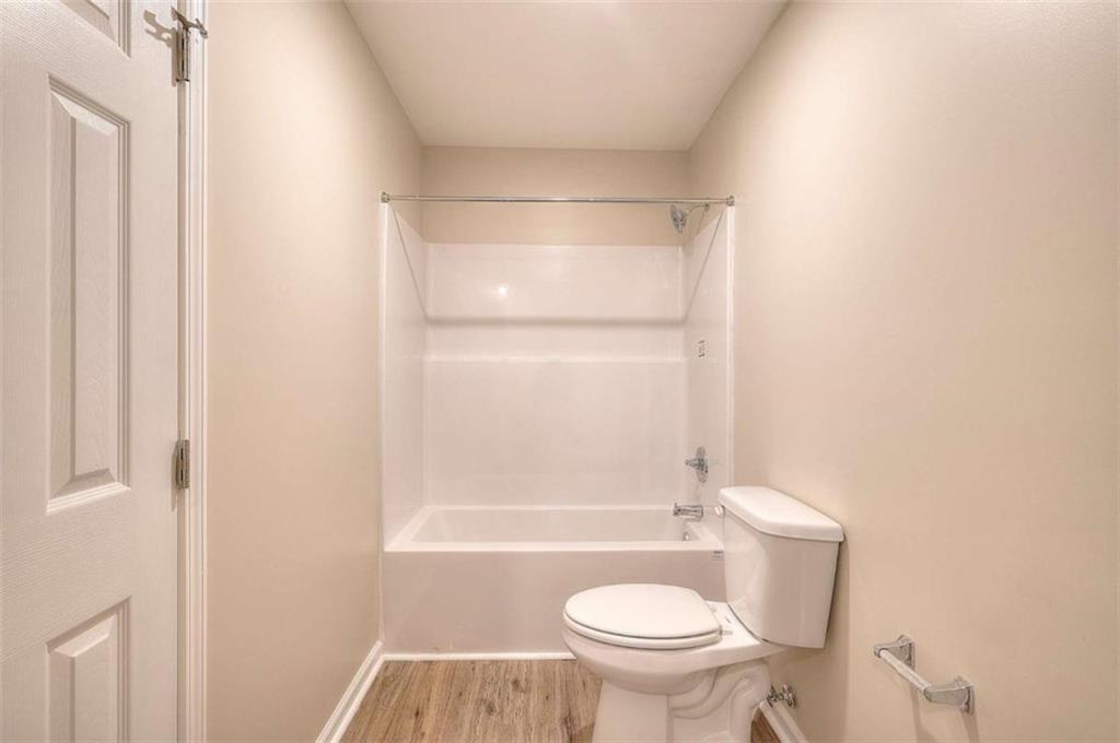 407 Wall Street Monroe, GA 30655 - Photo 20 of 51 a bathroom with a sink and a mirror