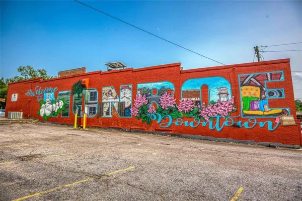 a view of front door with book