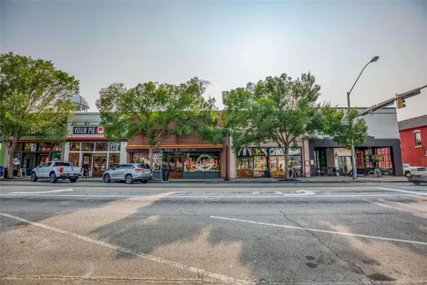 a front view of a building with street view