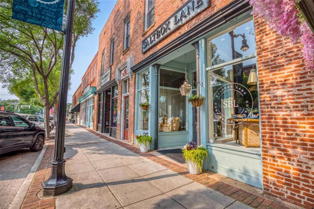 407 Wall Street Monroe, GA 30655 - Photo 35 of 51 a view of a brick building with many windows