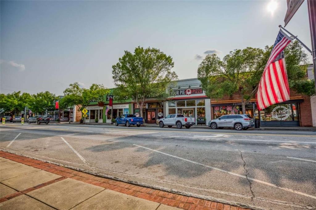 407 Wall Street Monroe, GA 30655 - Photo 46 of 51 a car parked in front of a building