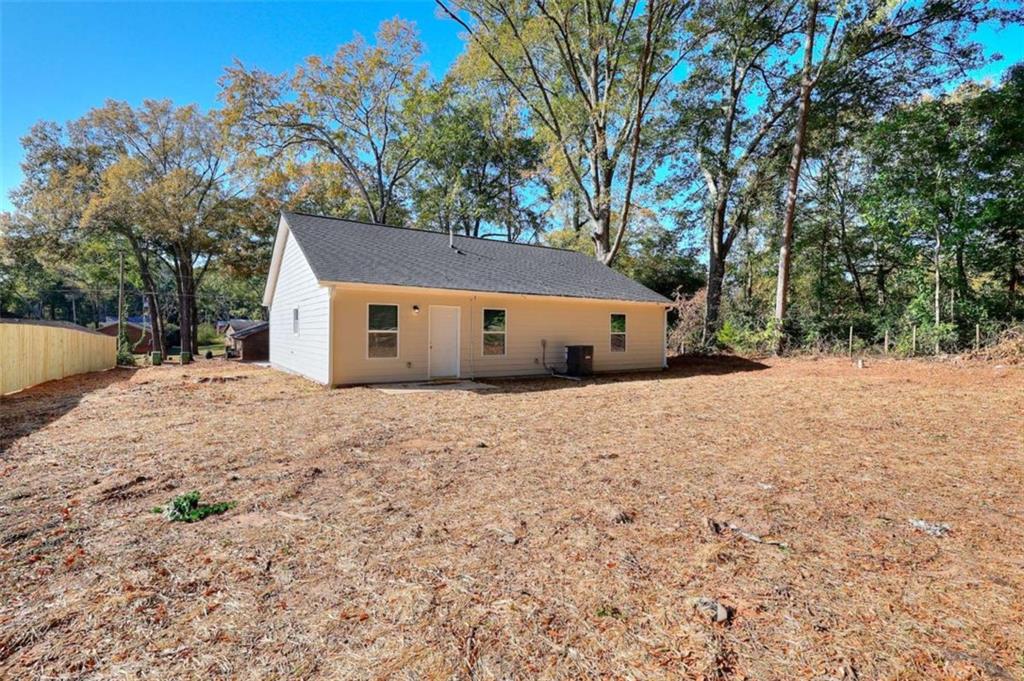 407 Wall Street Monroe, GA 30655 - Photo 6 of 51 a house view with a outdoor space