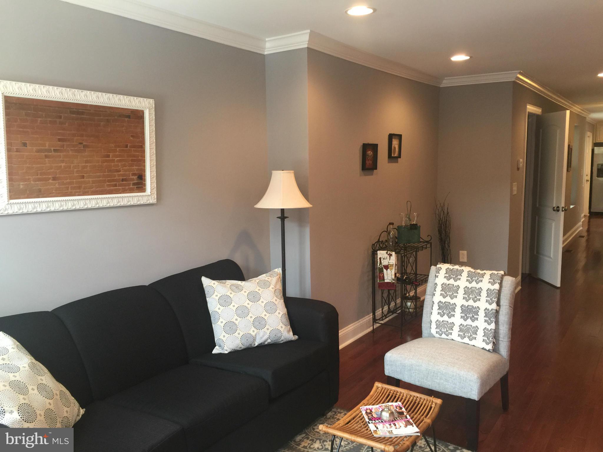 1446 Hull Street Baltimore, MD 21230 - Photo 1 of 30 Living Room off the front of home