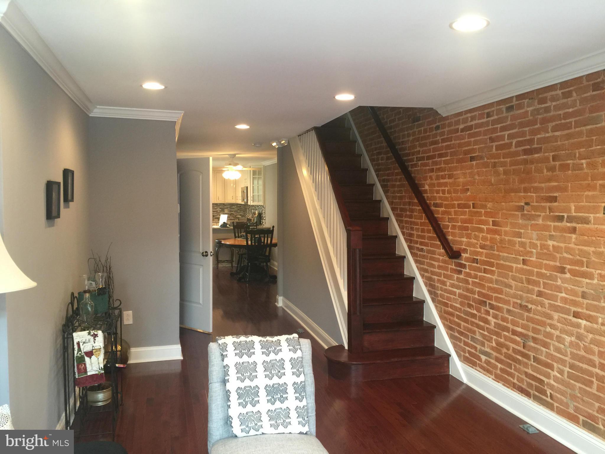 1446 Hull Street Baltimore, MD 21230 - Photo 2 of 30 Living Room looking into dining area