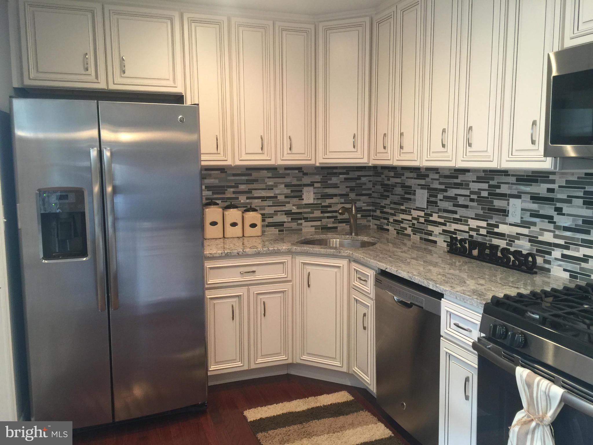 1446 Hull Street Baltimore, MD 21230 - Photo 5 of 30 Kitchen with stainless steel appliances