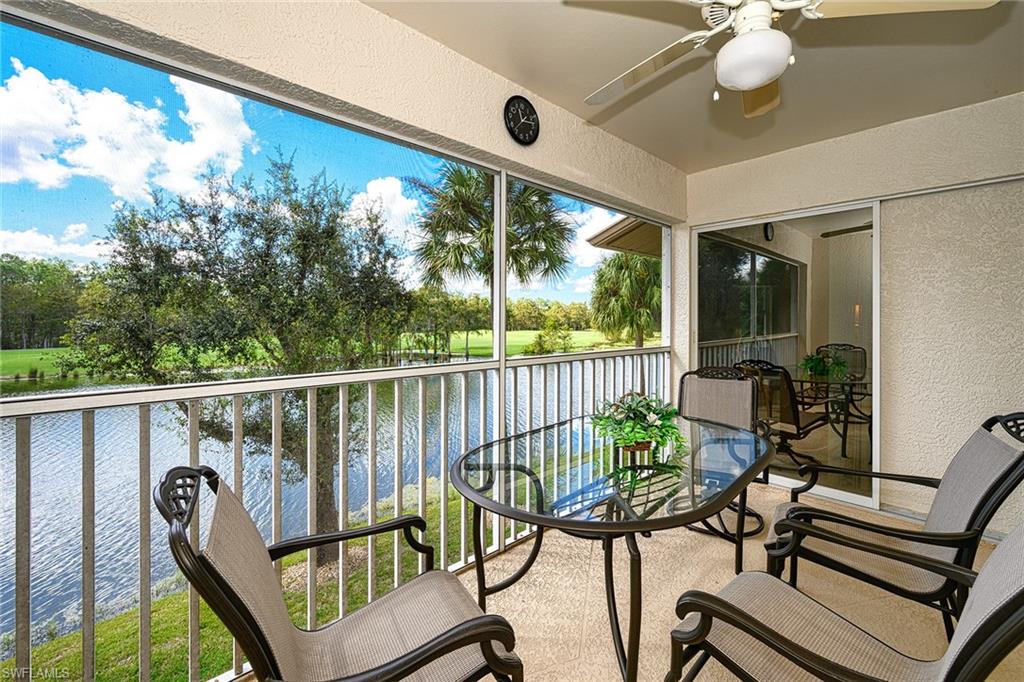 8640 Cedar Hammock Circle, Unit 523 Naples, FL 34112 - Photo 13 of 29 a view of a balcony with furniture