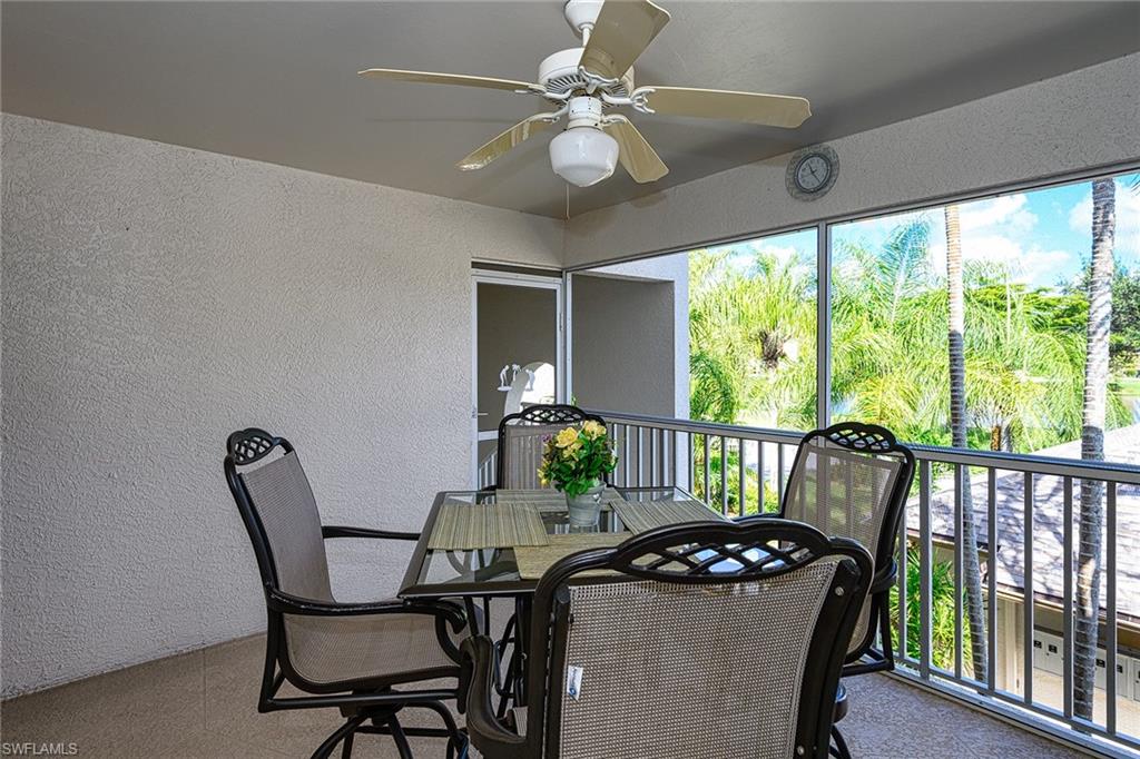8640 Cedar Hammock Circle, Unit 523 Naples, FL 34112 - Photo 3 of 29 a view of a dining room with furniture window and outside view