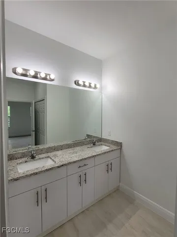 a bathroom with a shower and a toilet
