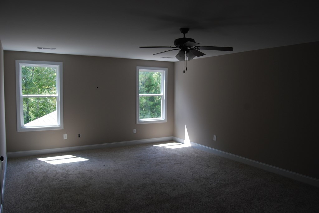 110 Carters Way Forsyth, GA 31029 - Photo 14 of 18 a view of an empty room with a window