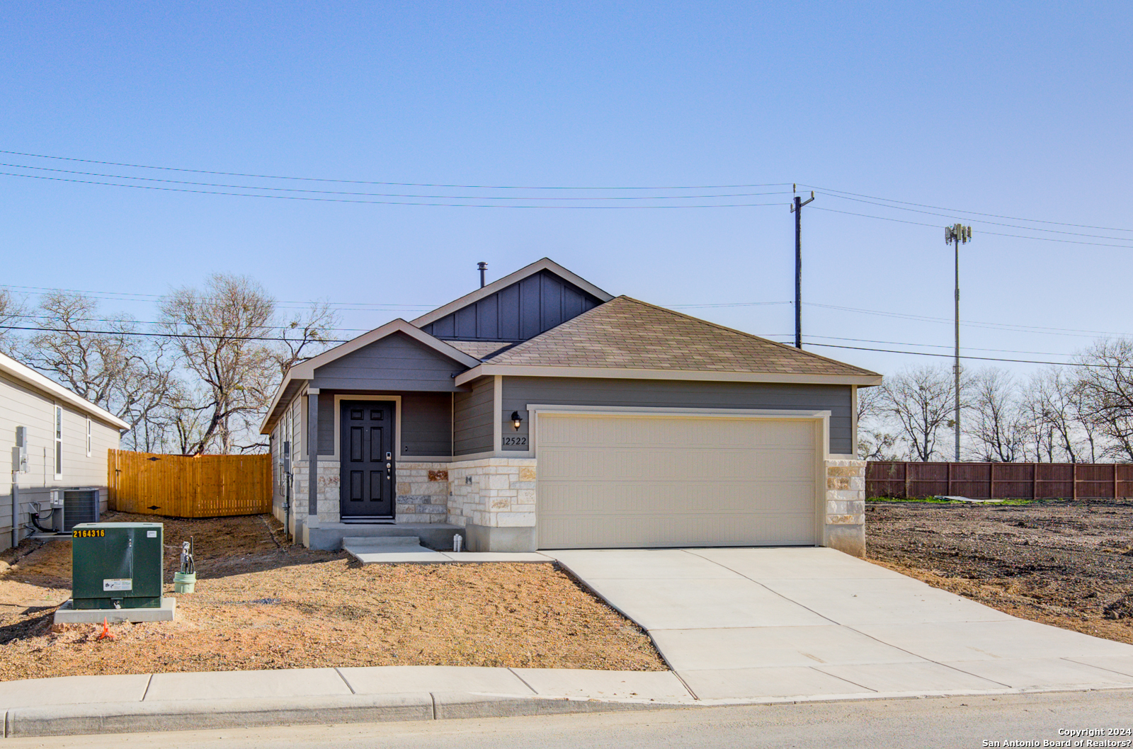 12522 Mildred Garden Von Ormy, TX 78073 - Photo 1 of 1 a front view of a house with garden