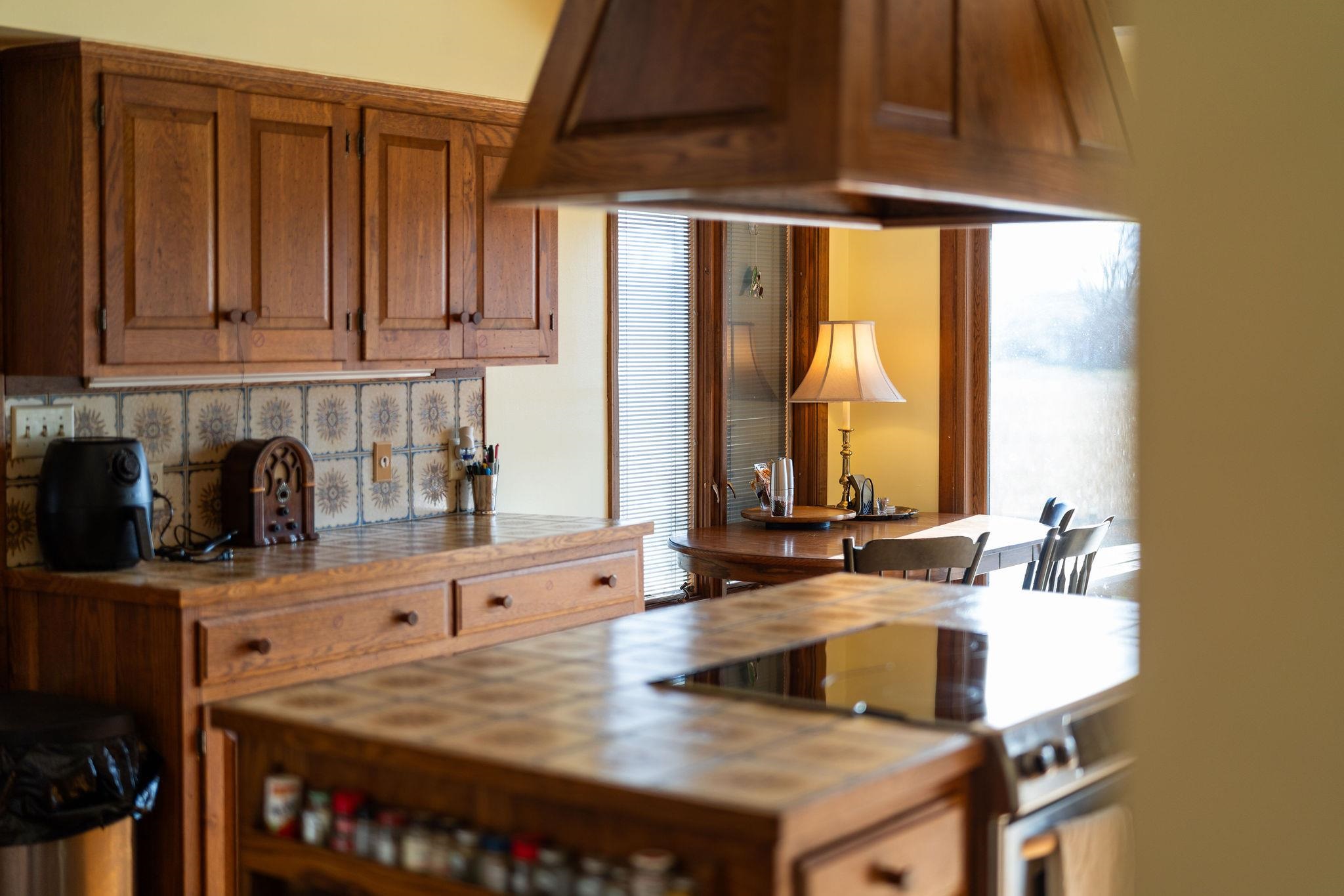 129 Shemariah Road Middlebrook, VA 24459 - Photo 19 of 75 a kitchen with a sink cabinets and a large window