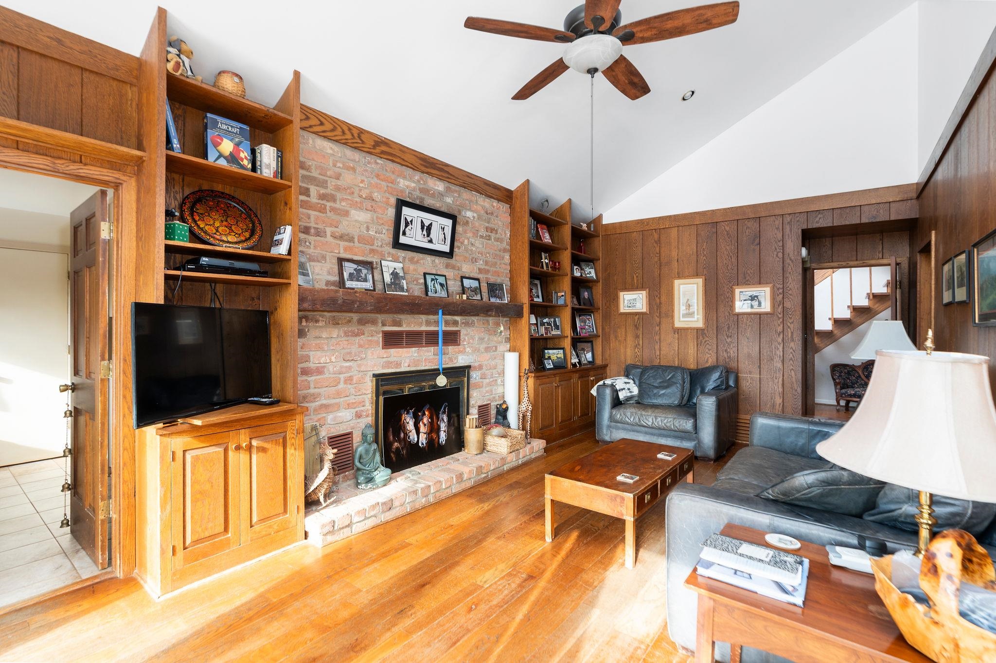 129 Shemariah Road Middlebrook, VA 24459 - Photo 20 of 75 a living room with furniture a flat screen tv and a fireplace