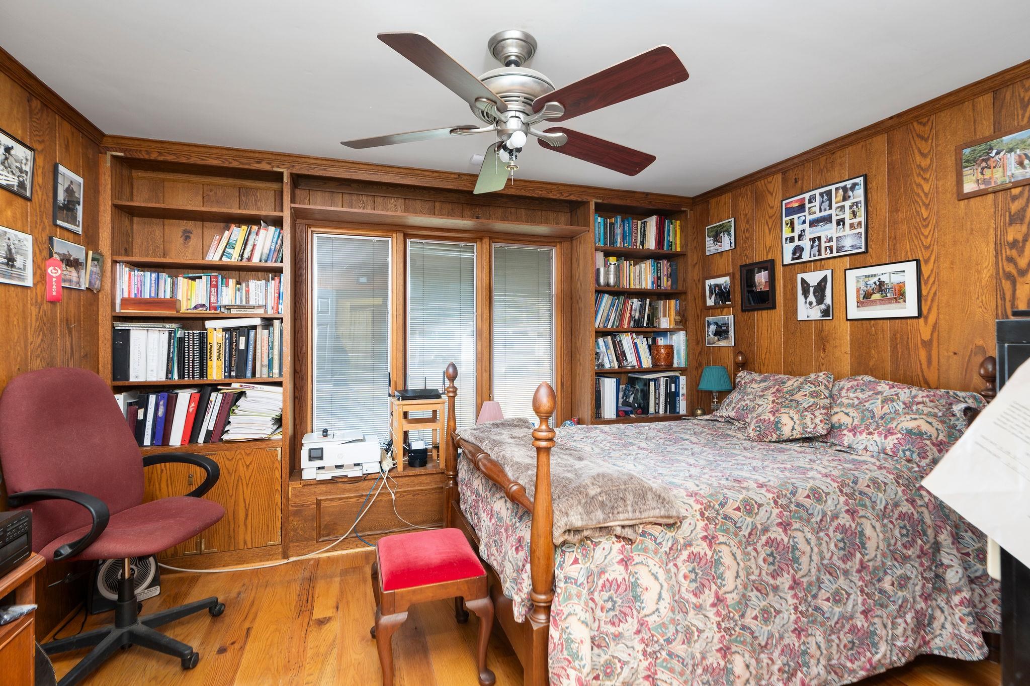 129 Shemariah Road Middlebrook, VA 24459 - Photo 30 of 75 a bedroom with a bed furniture and a chandelier