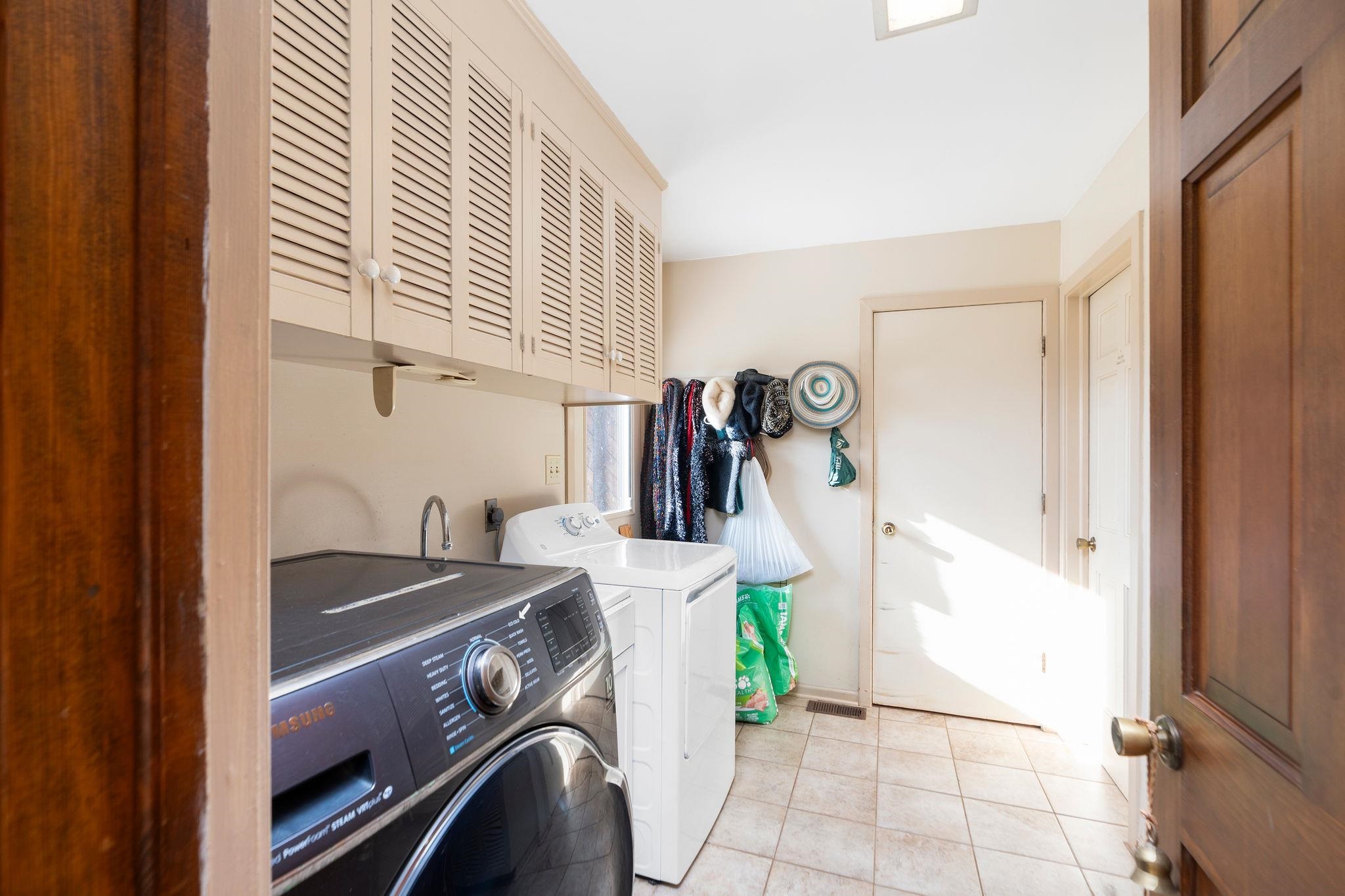 129 Shemariah Road Middlebrook, VA 24459 - Photo 35 of 75 a kitchen with a sink and a refrigerator