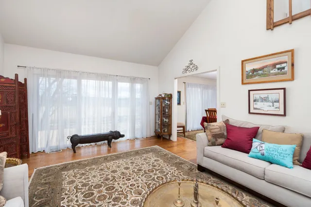 a kitchen with stainless steel appliances granite countertop a stove and cabinets