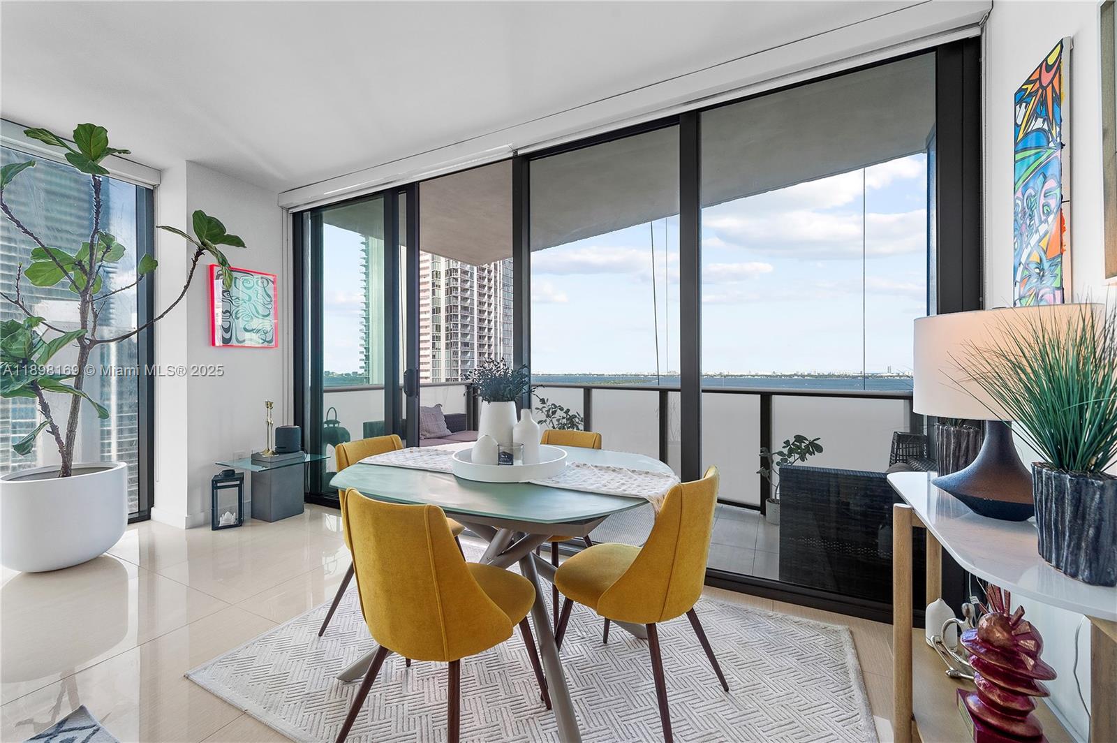 460 Northeast 28th Street, Unit 1901 Miami, FL 33137 - Photo 24 of 34 a view of a dining room with furniture window and outside view