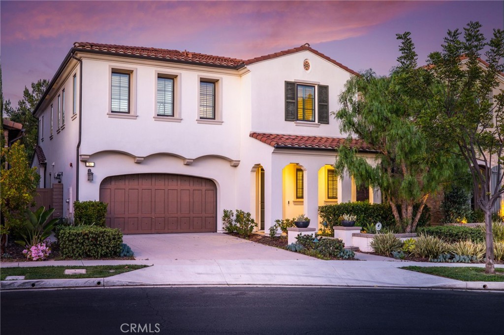 56 Derby Irvine, CA 92602 - Photo 1 of 1 a front view of a house with a yard and a garage