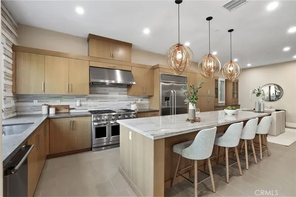 a kitchen with granite countertop a sink and a window