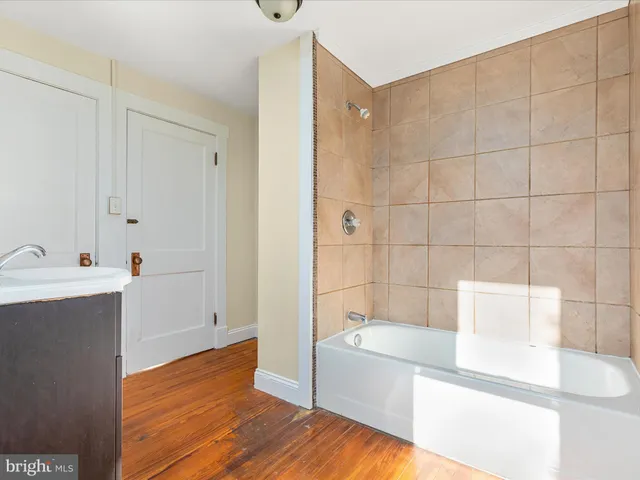 a bathroom with a sink and a bathtub