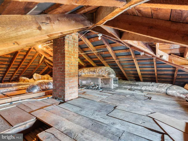a view of wooden deck and a garden
