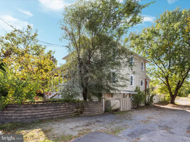 a house view with a garden space