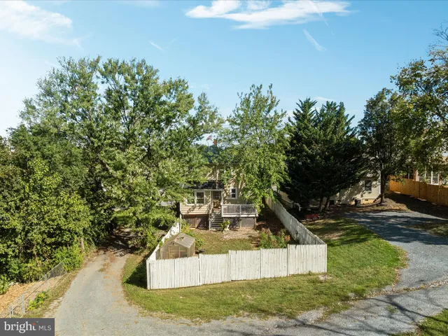 an aerial view of a city with lots of residential buildings