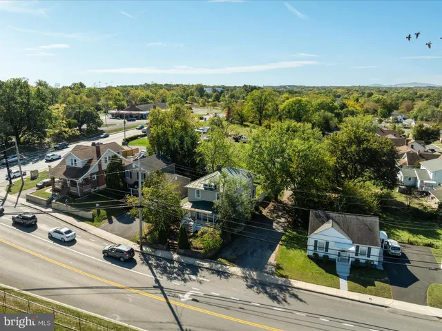 a front view of a building with retail shops