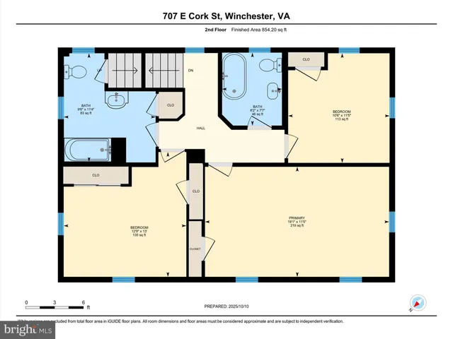 a view of a city with mountains in the background