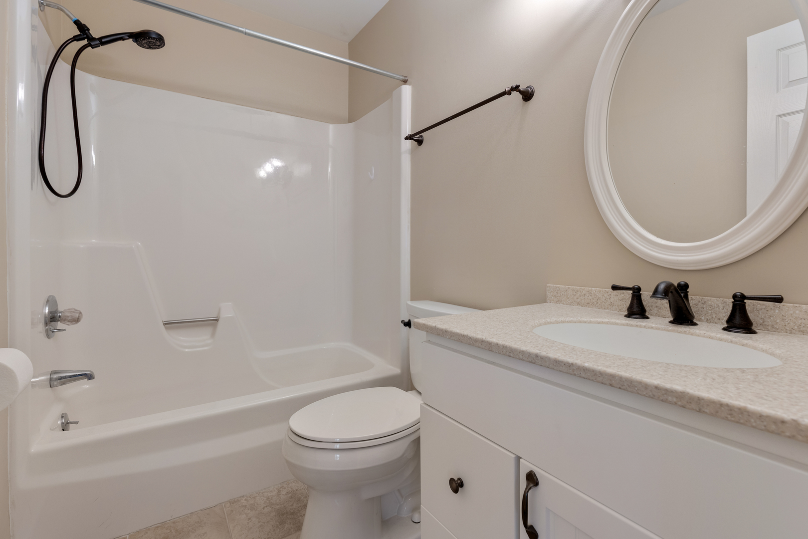 749 Shepard Court Gurnee, IL 60031 - Photo 12 of 22 a bathroom with a granite countertop sink a toilet and a mirror