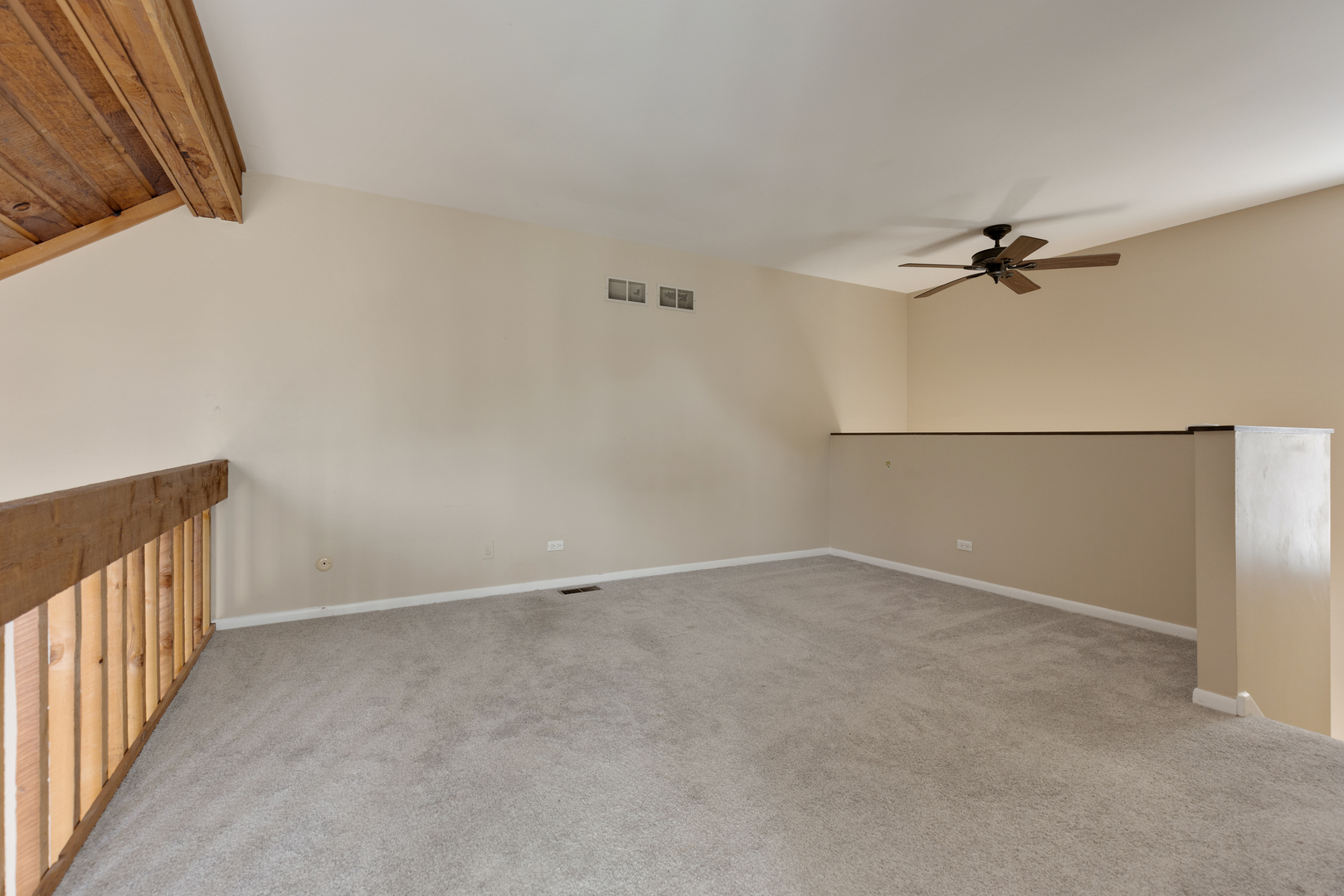 749 Shepard Court Gurnee, IL 60031 - Photo 14 of 22 a view of an empty room with a ceiling fan
