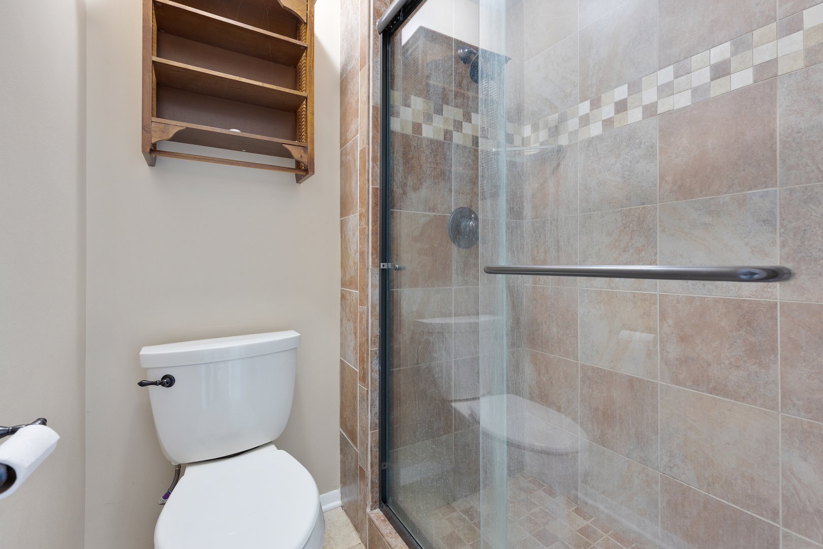 749 Shepard Court Gurnee, IL 60031 - Photo 17 of 22 a bathroom with a toilet and a shower