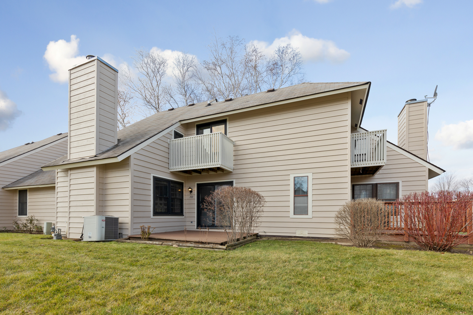 749 Shepard Court Gurnee, IL 60031 - Photo 19 of 22 a front view of a house with a yard