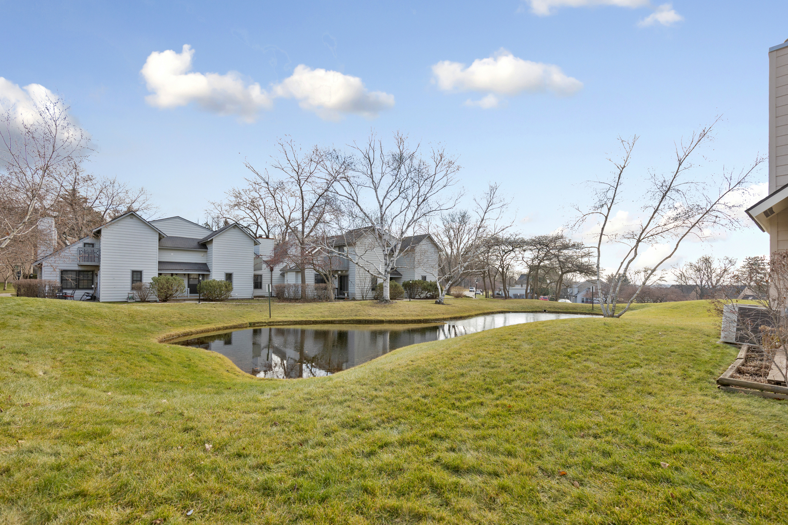 749 Shepard Court Gurnee, IL 60031 - Photo 22 of 22 a view of a swimming pool with an outdoor space and seating area