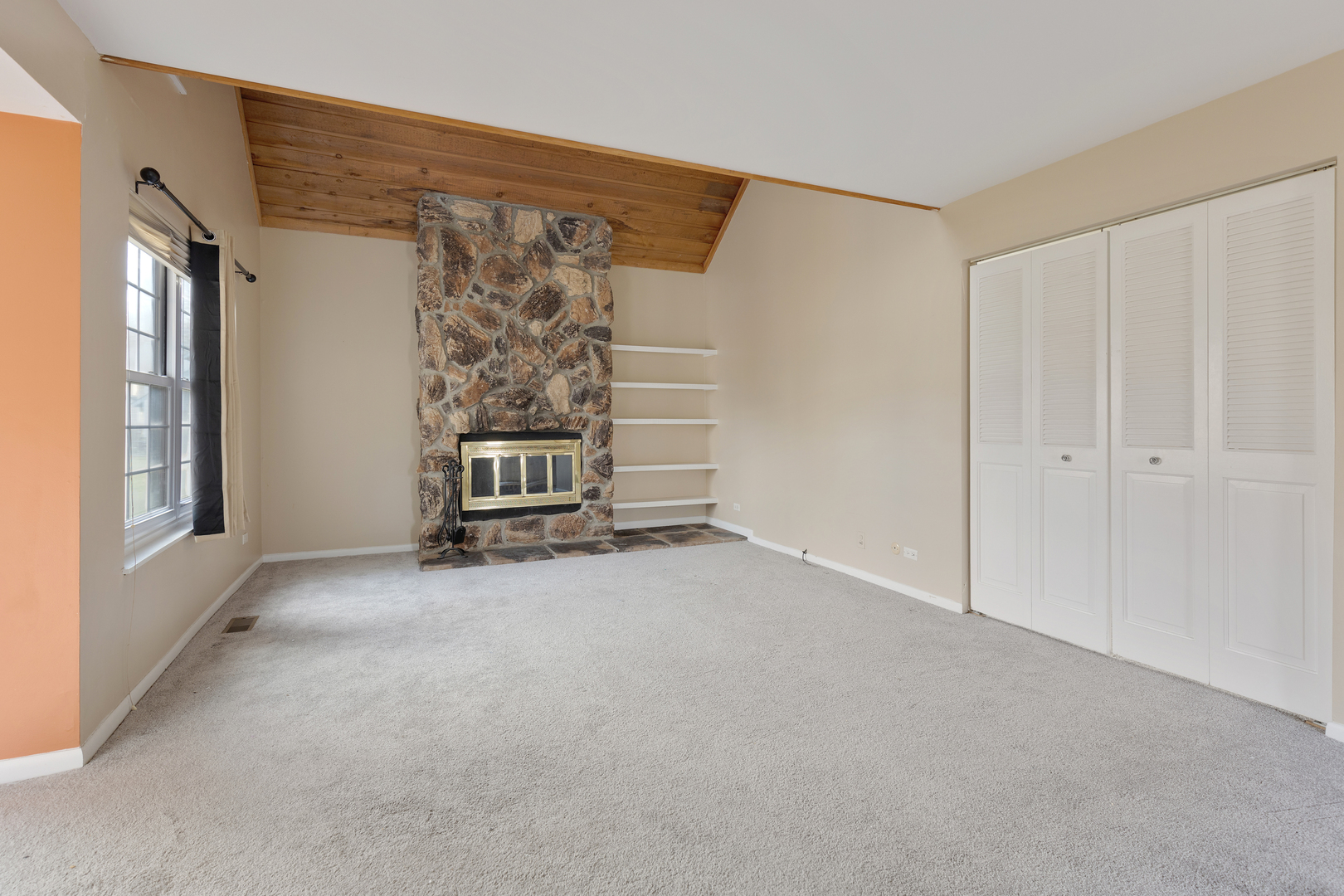 749 Shepard Court Gurnee, IL 60031 - Photo 6 of 22 a view of an empty room with a fireplace