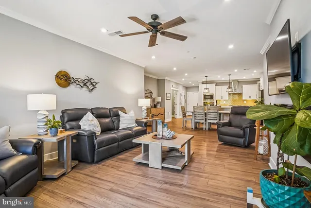 a bathroom with a double vanity sink mirror and shower