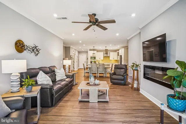 a bathroom with a double vanity sink mirror and shower