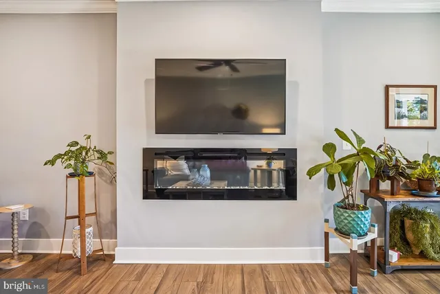 a bedroom with a bed and a table