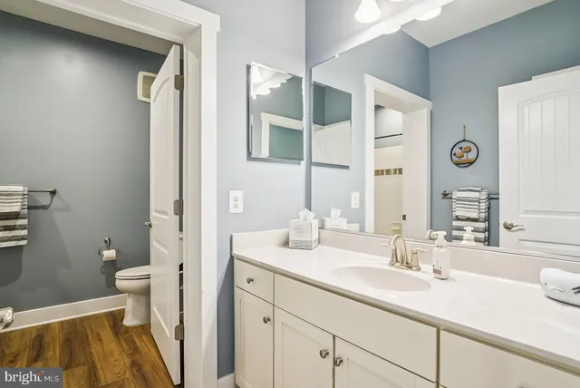 a outdoor space with lots of tables a chair and a fireplace