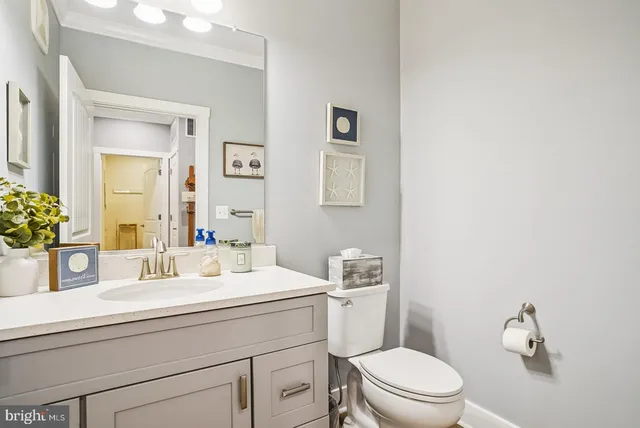 a front view of a house with a yard and porch