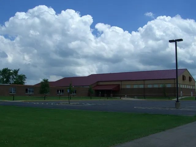 a view of house with outdoor space and yard