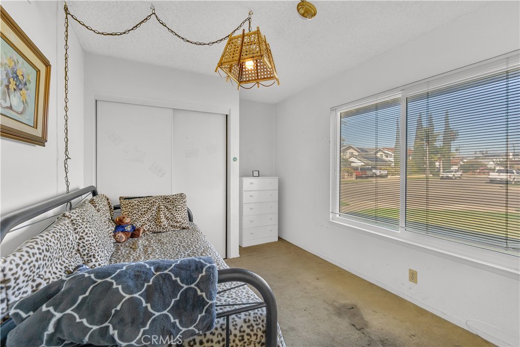 4422 East Silverleaf Avenue Orange, CA 92869 - Photo 20 of 27 a bedroom with a bed and a window