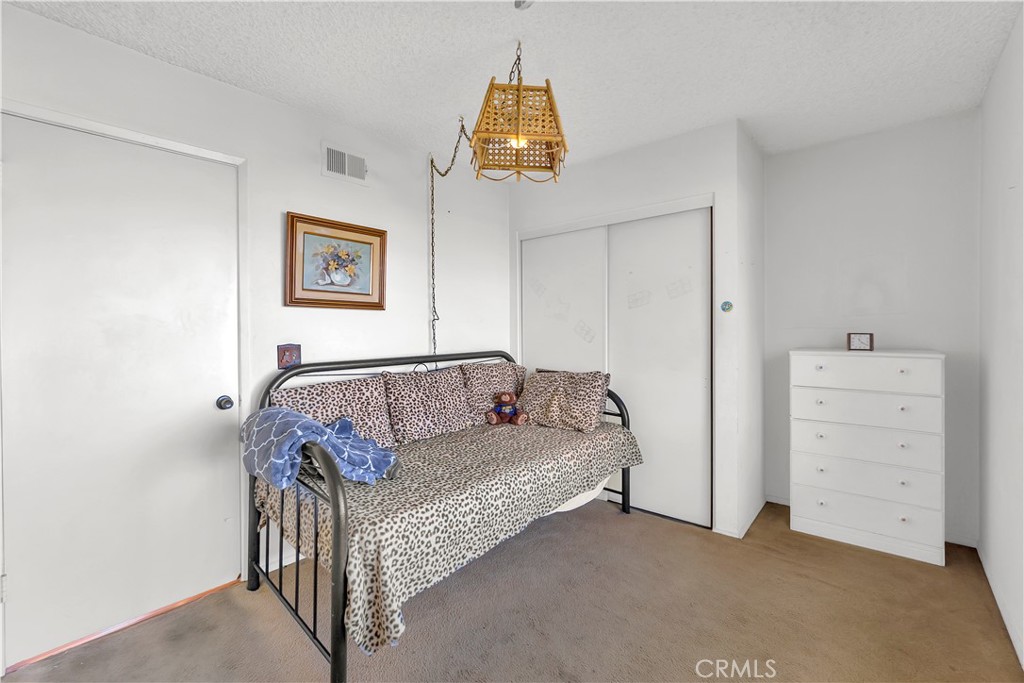 4422 East Silverleaf Avenue Orange, CA 92869 - Photo 21 of 27 a living room with furniture and a window