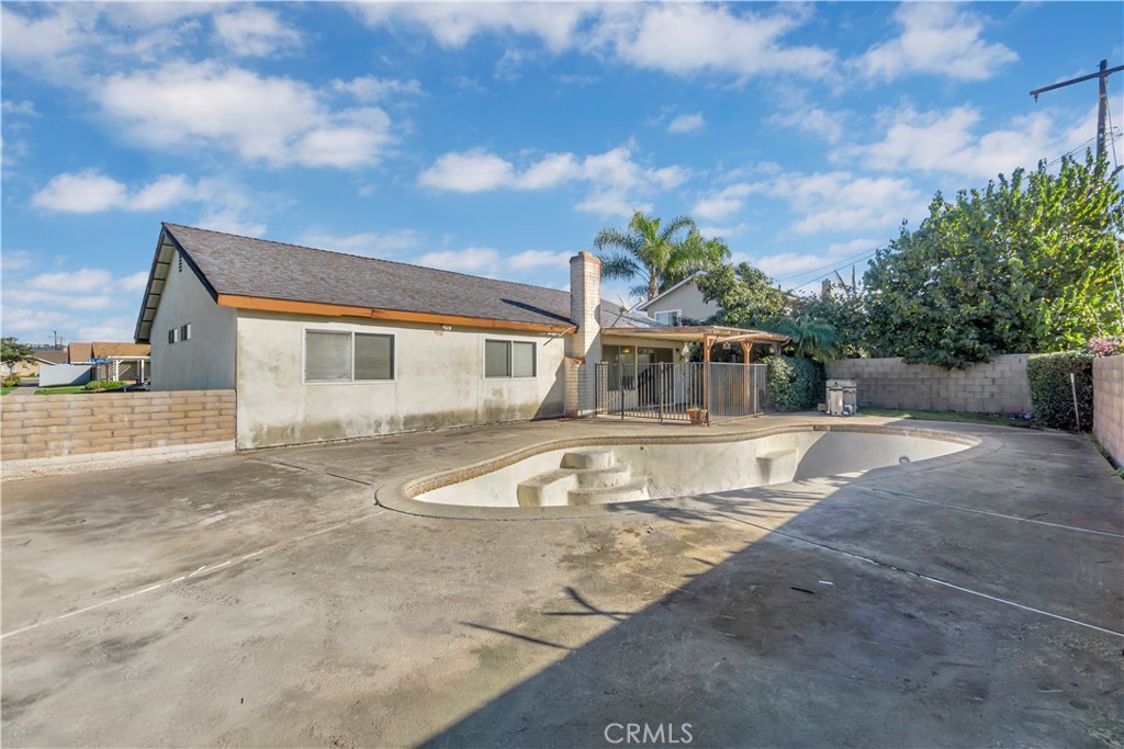 4422 East Silverleaf Avenue Orange, CA 92869 - Photo 25 of 27 a front view of a house with a yard