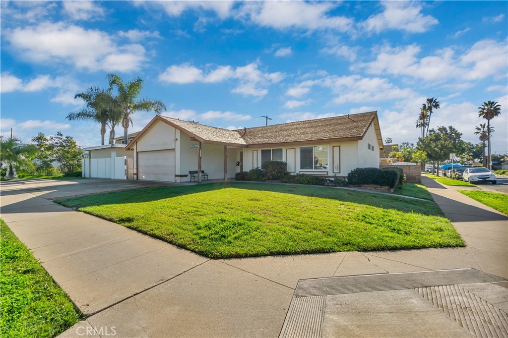 4422 East Silverleaf Avenue Orange, CA 92869 - Photo 4 of 27 a view of house with a yard