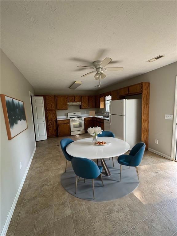 1727 Oak Grove Church Road, Unit B Carrollton, GA 30117 - Photo 4 of 13 a view of a dining room with furniture