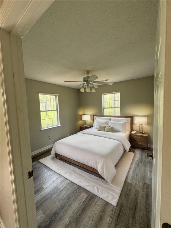 1727 Oak Grove Church Road, Unit B Carrollton, GA 30117 - Photo 7 of 13 a bedroom with a bed and a window
